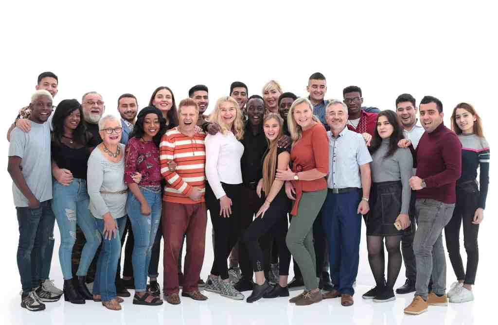 Large group of multiethnic cheerful people isolated over white background